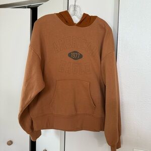 American Eagle, hooded sweatshirt M
 color is rust two tone Hood is darker.